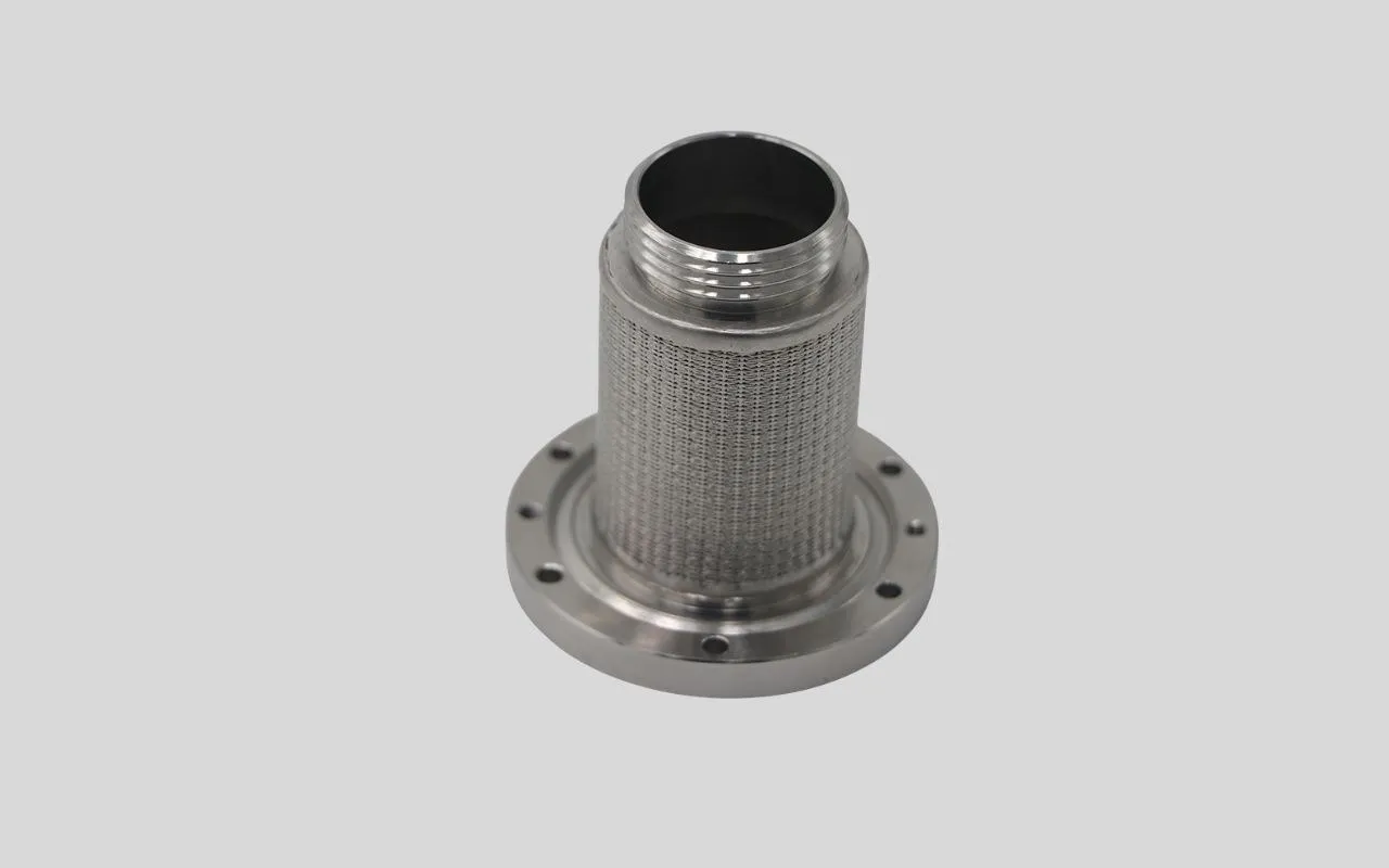 A CNC-machined stainless steel filter housing produced by PURESPEC.