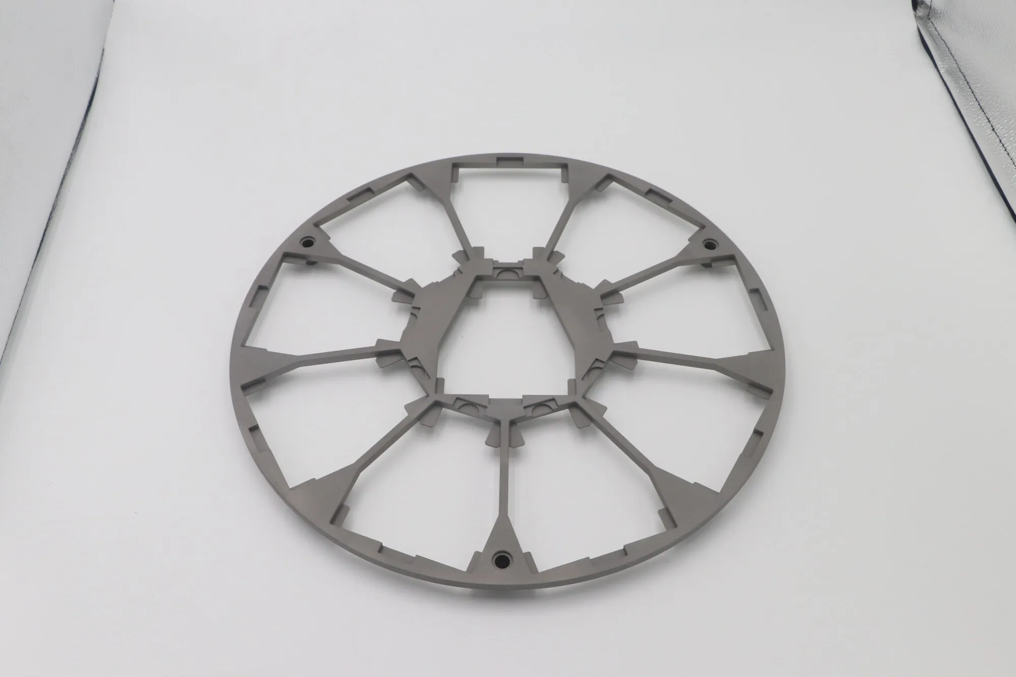 Large CNC milled aluminum spoked ring frame with thin radial webs