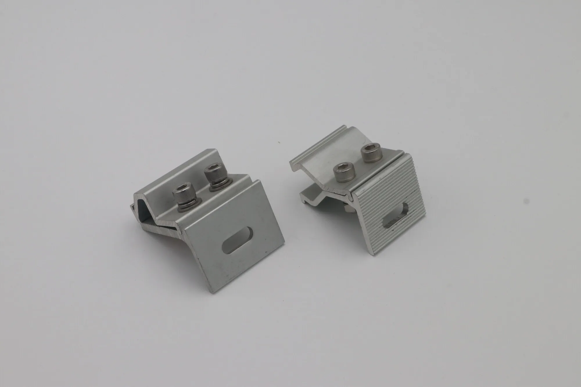 Set of aluminum mounting clamp hardware with stainless bolts and formed brackets